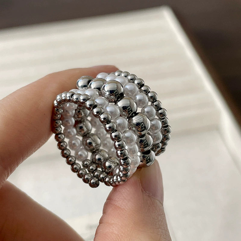 Vintage Pearl Beaded Open Ring A bold layered ring with pearl-style shine, black bead contrast, and effortless vintage charm.