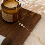 Gold Pearl Leaf Bracelet Delicate shine, soft pearl elegance, and a graceful leaf-inspired finish.