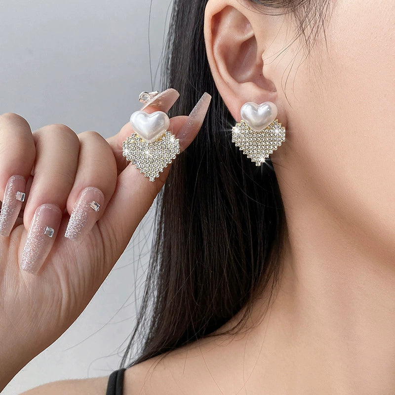 Vintage Pearl Heart Crystal Stud Earrings Sweet, sparkling, and effortlessly feminine.