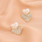 Vintage Pearl Heart Crystal Stud Earrings Sweet, sparkling, and effortlessly feminine.
