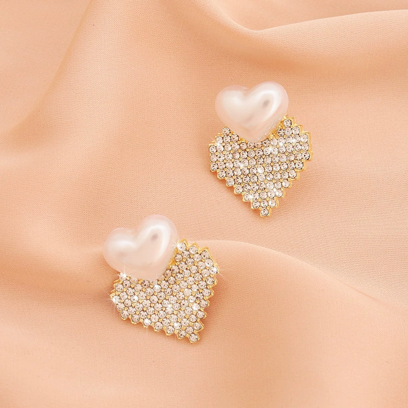 Vintage Pearl Heart Crystal Stud Earrings Sweet, sparkling, and effortlessly feminine.